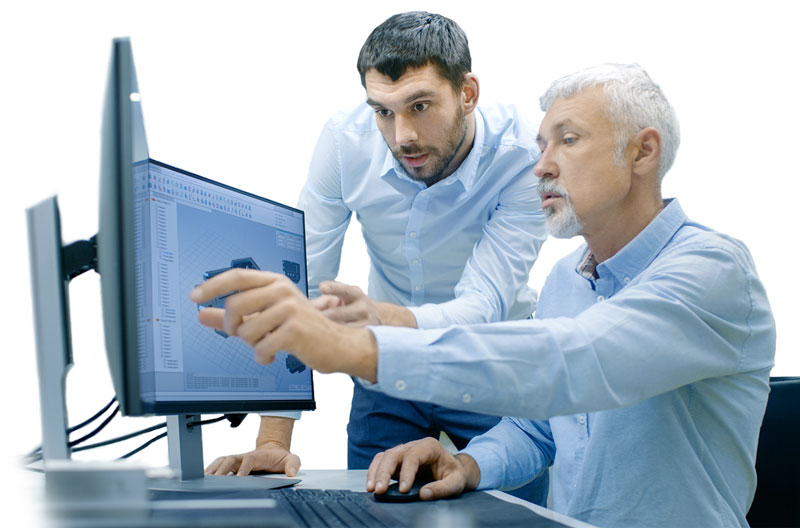 photo of pharmaceutical coworkers looking at statistical results on a computer